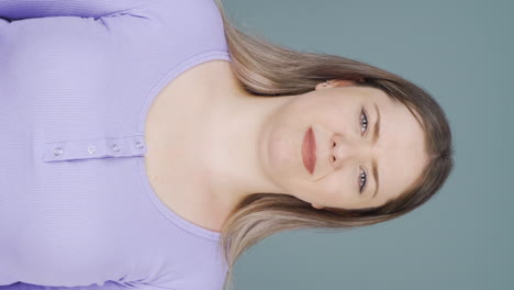 Vertical-video-of-The-woman-is-disgusted.